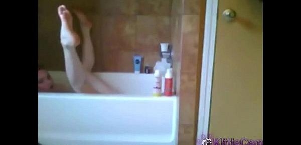  Cute teen camgirl toys her pussy and ass in the shower